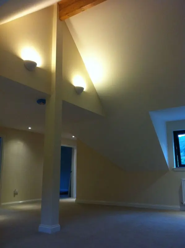 Arnisdale upstairs room with vaulted ceiling, exposed beam and dormer window