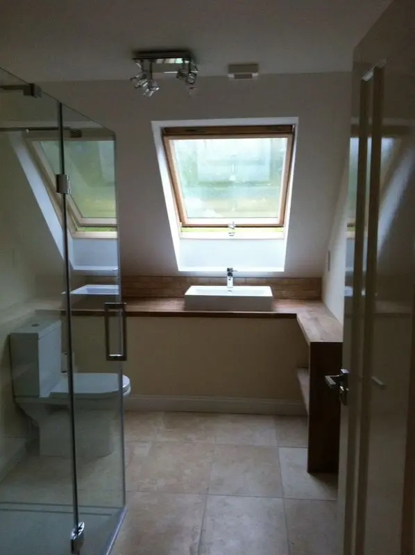 Arnisdale bathroom with rooflight, timber vanity and walk-in shower