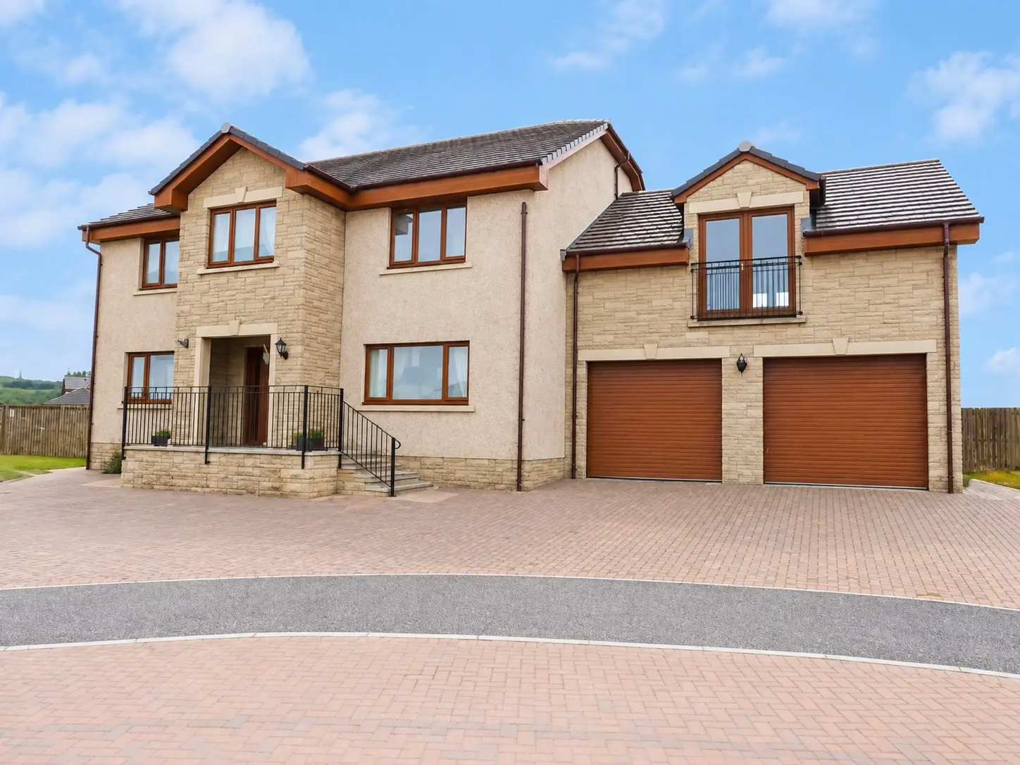 Finished Breich home with stone and render frontage and double garage