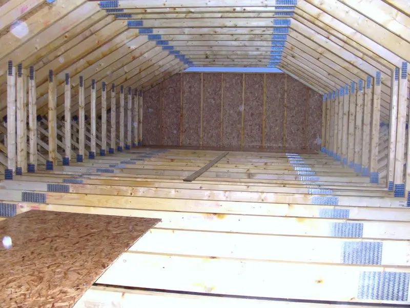 Inside the roof space, with the trusses and gable