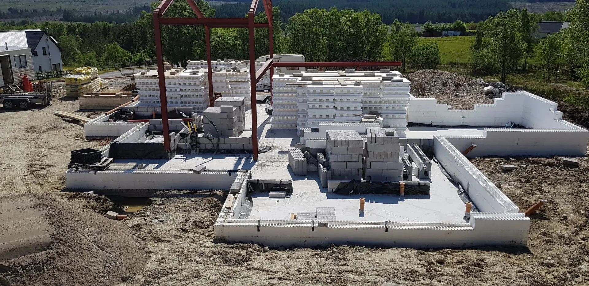 ICF walls rising around the steel frame