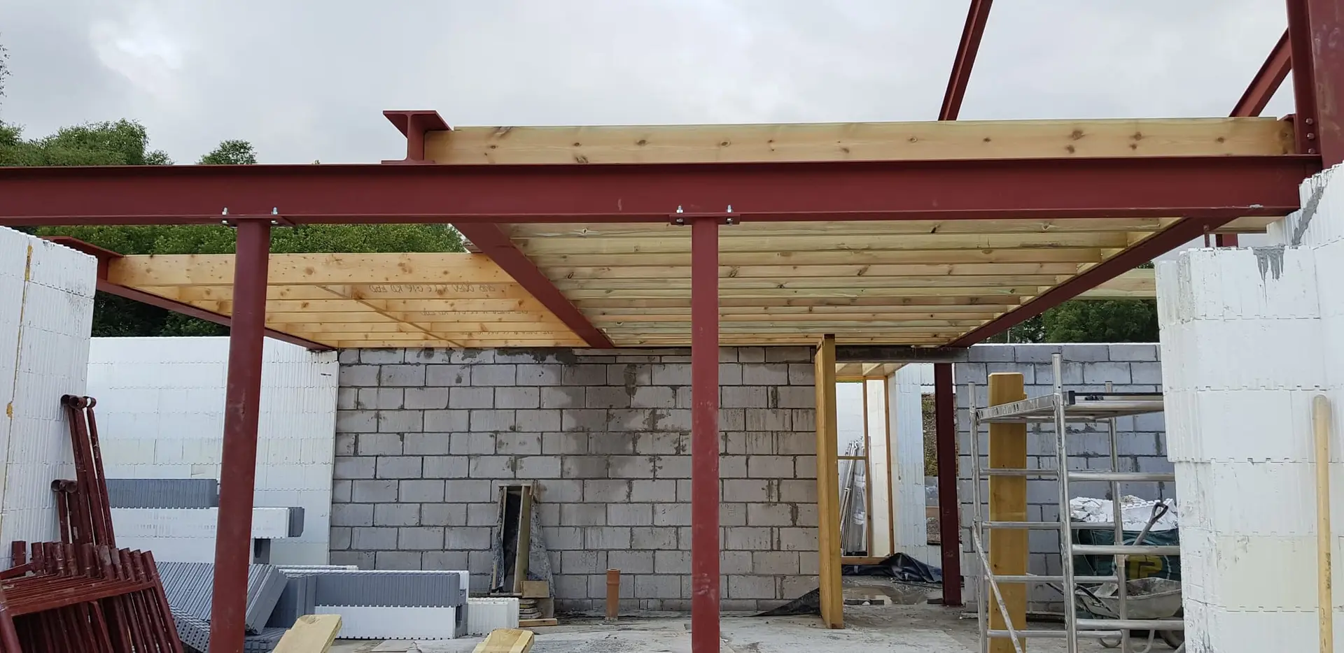 Steel beams and timber joists carrying the first floor