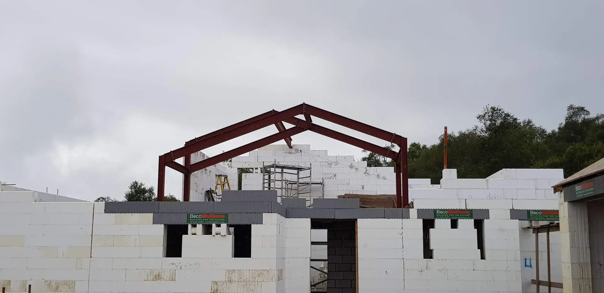 Upper ICF walls built up around the steel portal frames