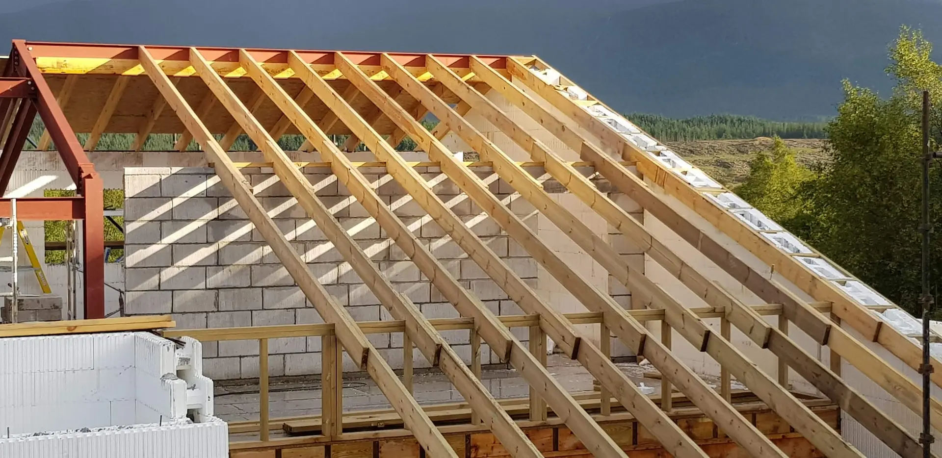Roof rafters fixed to the steel frame