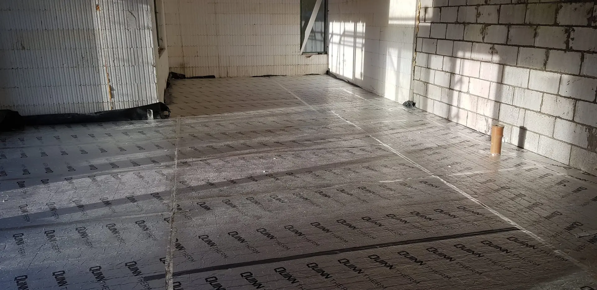 Floor insulation boards laid ready for the underfloor heating