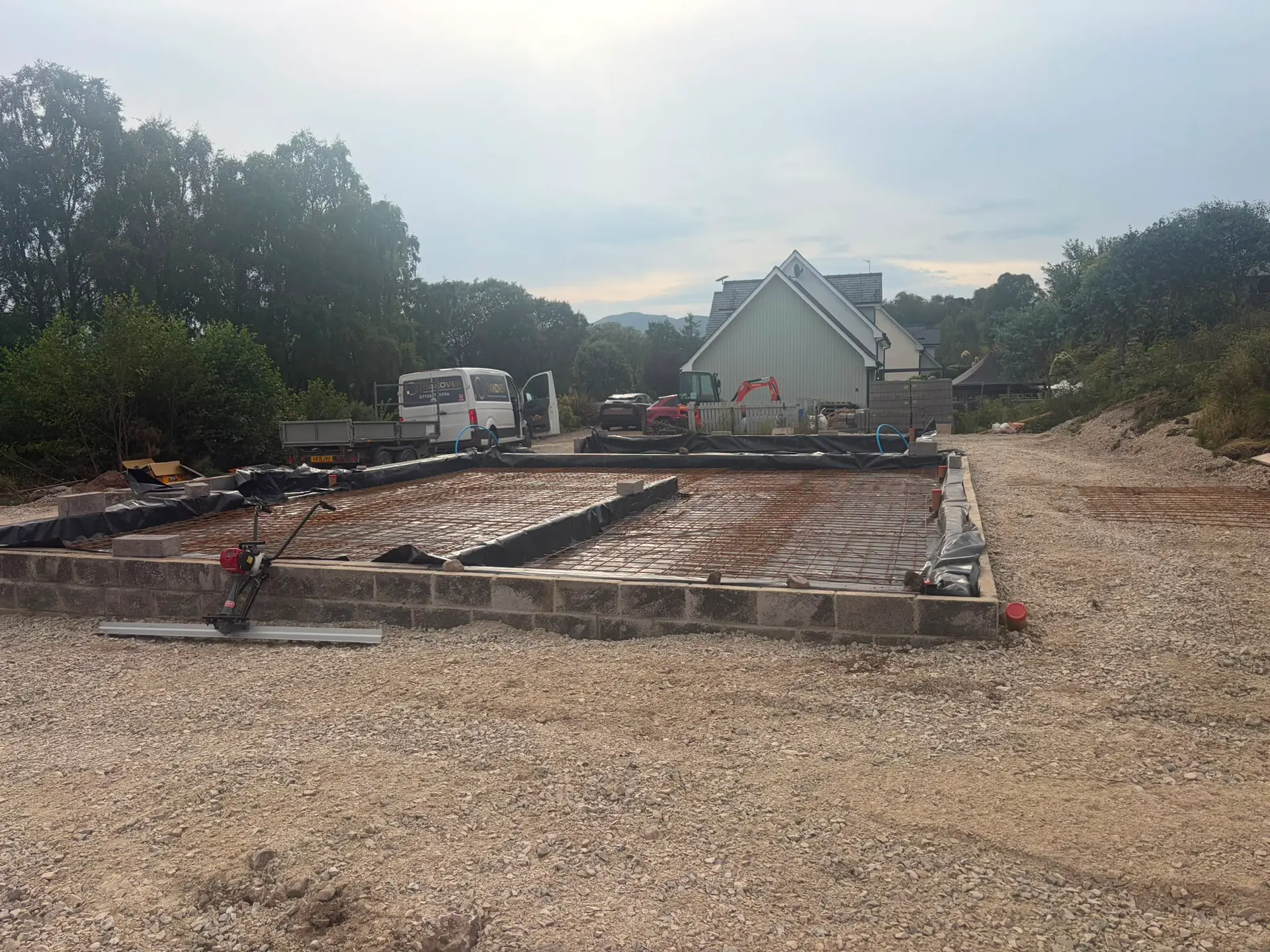 Reinforced slab ready to pour, with the Oakover van on site