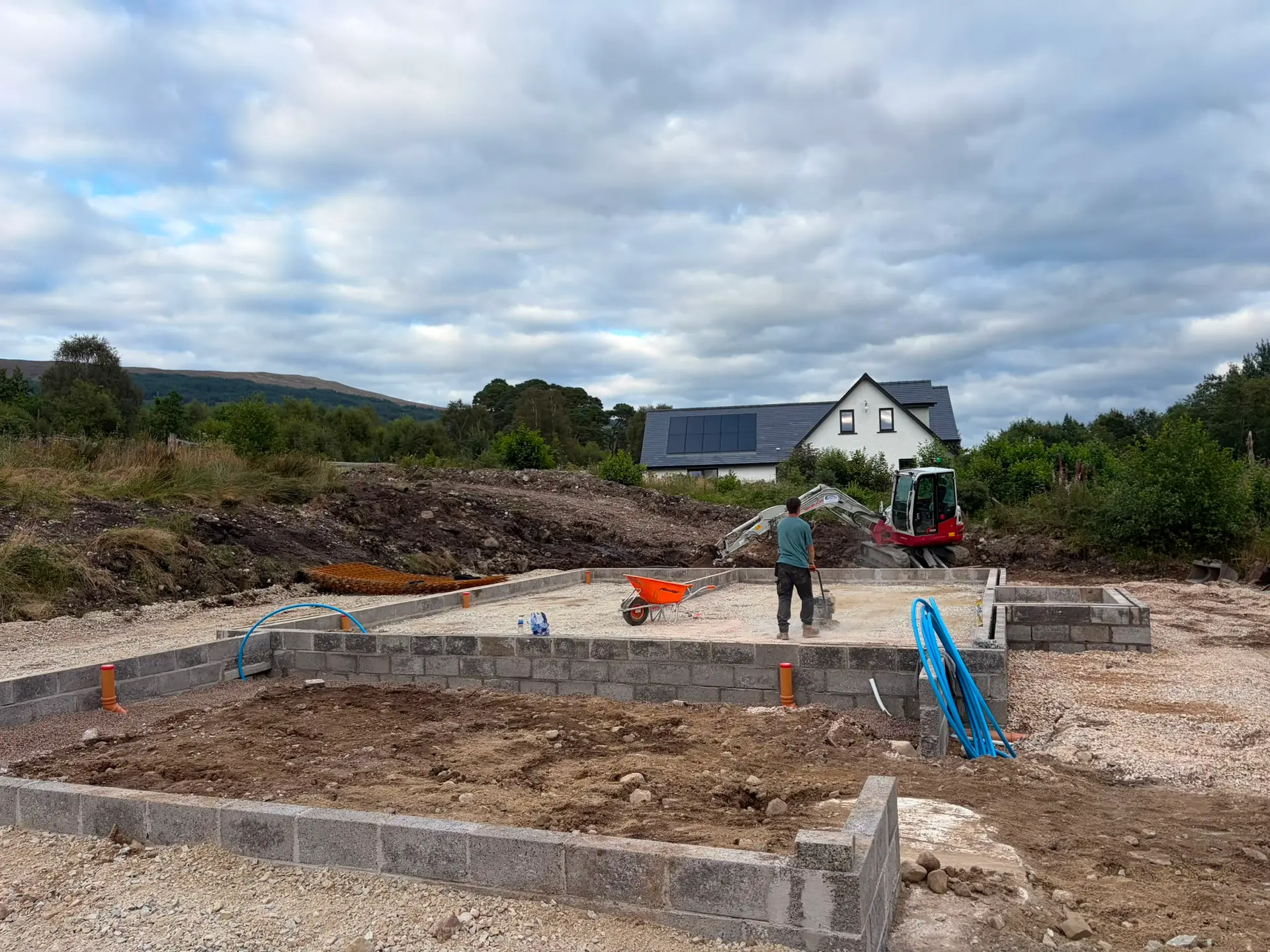 Blockwork foundations with the sub-base being compacted
