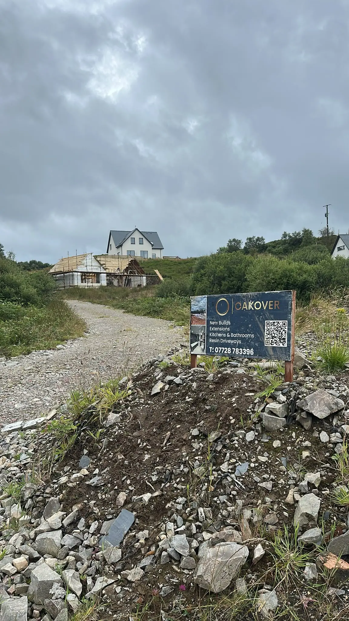 Kinloid under scaffold with the roof boarded, behind the Oakover site sign