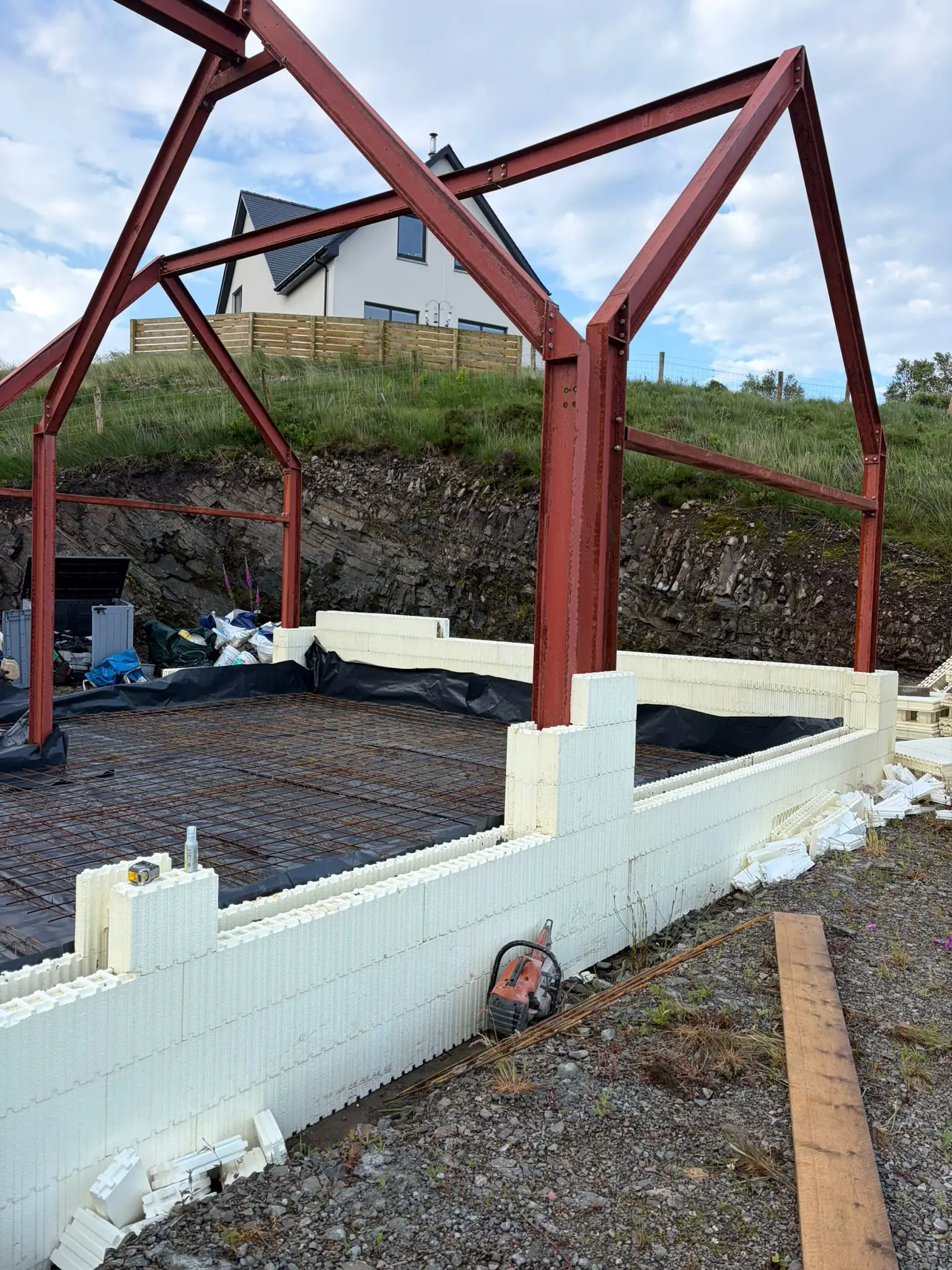 ICF wall corner and steel frame, with reinforcement mesh inside